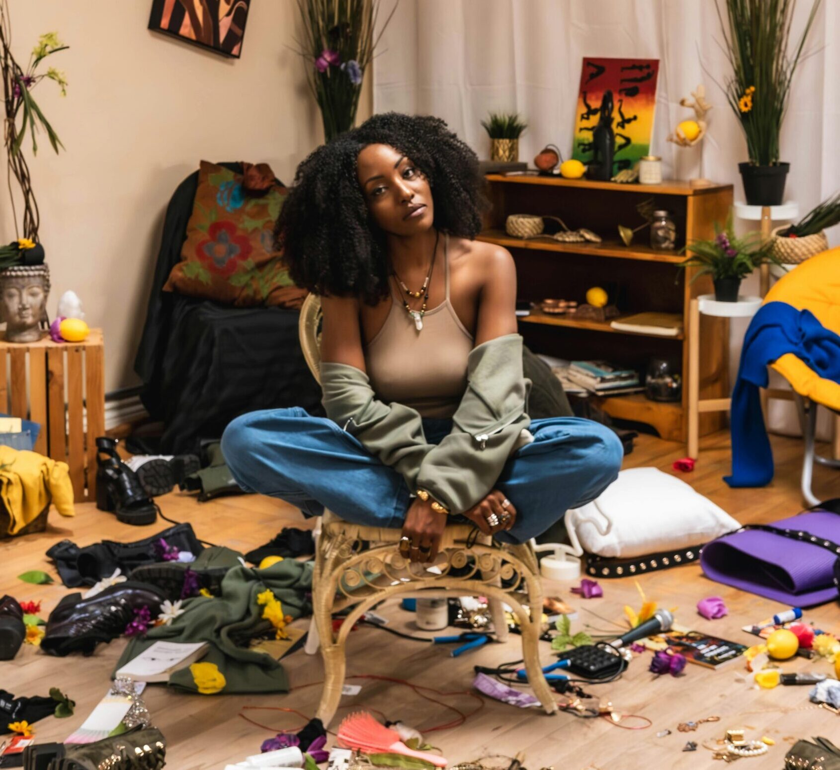 Closet decluttering before the holidays Woman overwhelmed by a cluttered closet before the holidays